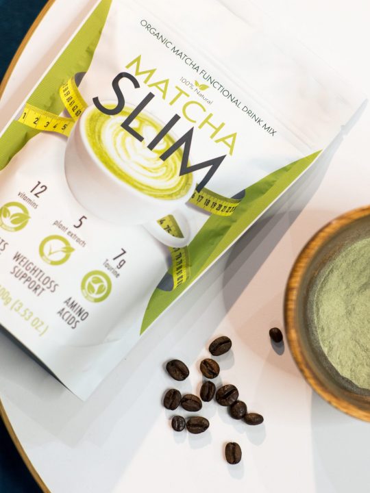 Matcha Slim product displayed next to poured matcha